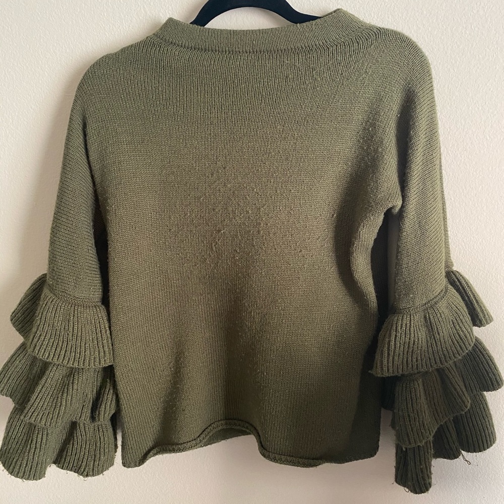 Green sweater with ruffled sleeves!